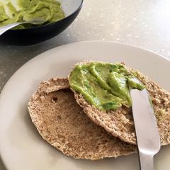 A picture of Avocado Butter with Seeded Pitta Bread.