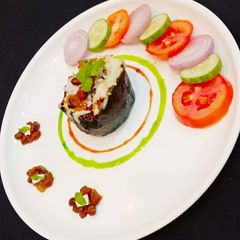 A picture of Cheesy Kidney Beans Rice Stuffed Eggplant.