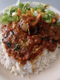A picture of White rice with stew.