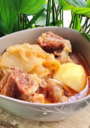 A picture of Beef Ribs Stew with Kimchi & Potatoes.