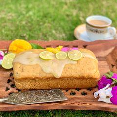 A picture of Mango Loaf Cake with lime glaze.