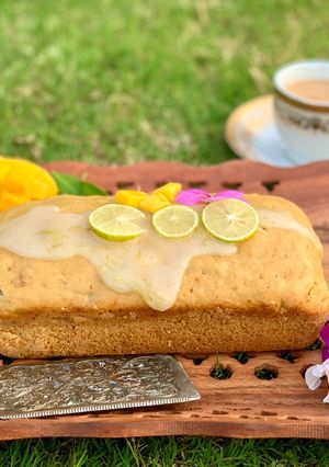 A picture of Mango Loaf Cake with lime glaze.
