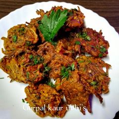 A picture of Punjabi Thunder Onion Pakoras (fritters).