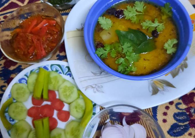 Tasty pumpkin lentils with pickle,salad and chutney