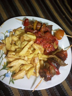 A picture of Fried potatoes and Giza source.