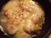 Una foto de queso leche a la parmesana
