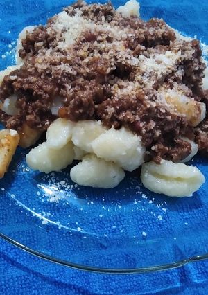 Una foto de Ñoquis con salsa bolognesa