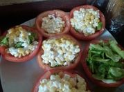 Una foto de tomate relleno de chile