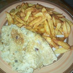 A picture of Chips and fried egg.