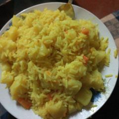 A picture of Mixed rice with tumeric.
