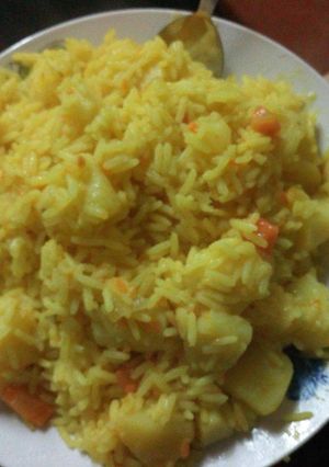 A picture of Mixed rice with tumeric.