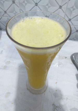 A picture of Paineapple and mint leave drink.