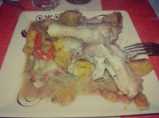 Una foto de pollo al disco condimentos