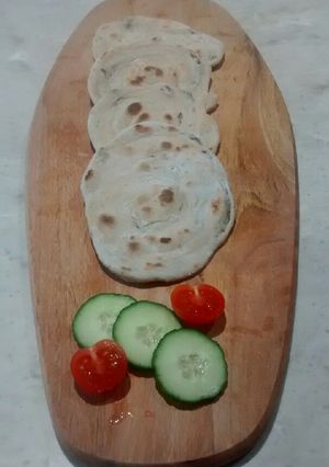 A picture of Pesto and Tomato flatbread.