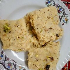A picture of Kesar Coconut Burfi.