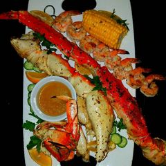 A picture of Mike's Poseidon Platter With Dungeness Crab Side Salad.