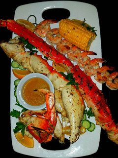 A picture of Mike's Poseidon Platter With Dungeness Crab Side Salad.