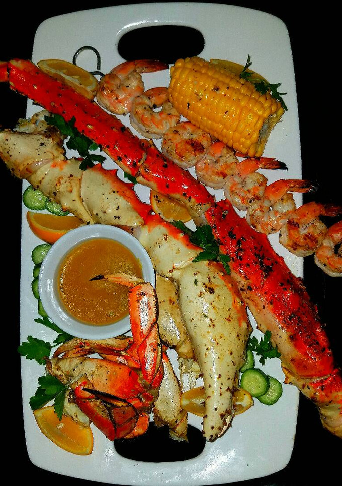 A picture of Mike's Poseidon Platter With Dungeness Crab Side Salad.