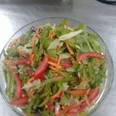 A picture of Tomato lettuce salad.