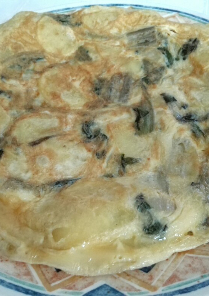 Una foto de Tortilla de patatas y acelgas