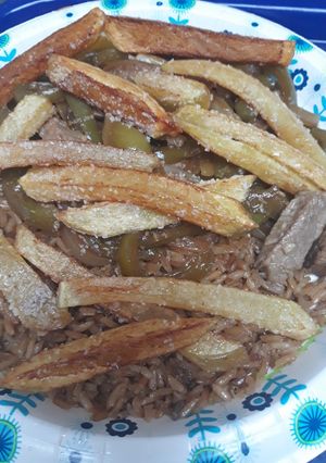 A picture of Lomo Saltado.