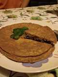 Tortilla de harina de garbanzo con especias y tomates secos