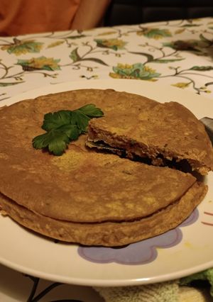 Una foto de Tortilla de harina de garbanzo con especias y tomates secos