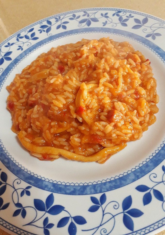 Una foto de Arroz caldoso con calamares