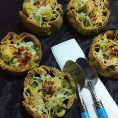 A picture of Cheesy spinach gatte in missi cups.