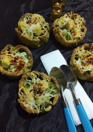A picture of Cheesy spinach gatte in missi cups.