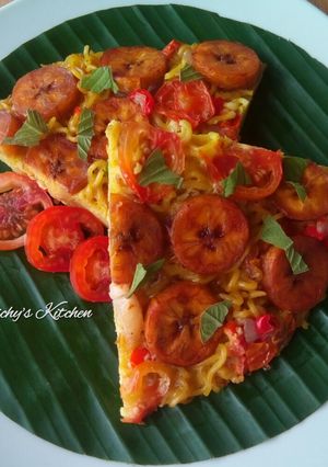 A picture of Noodles and plantain frittata.