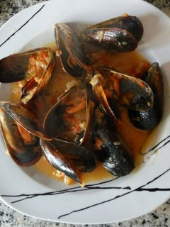 Una foto de Mejillones picantes al cilantro