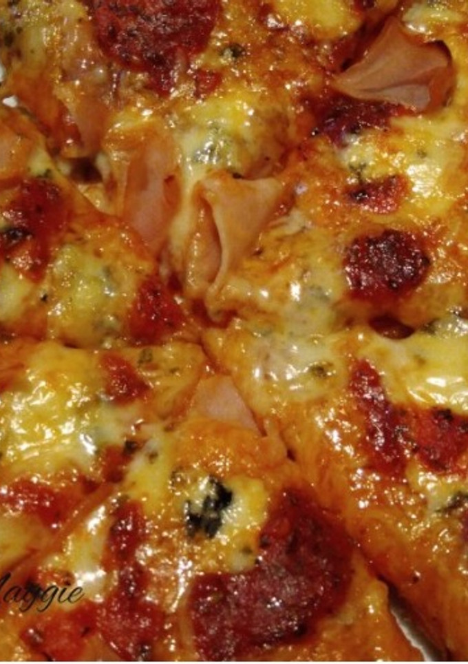 Una foto de Pizza 4 quesos