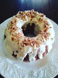 A picture of Banana Bundt Cake with Vanilla Cream Cheese Frosting.