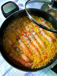 Una foto de Arroz con cigalitas