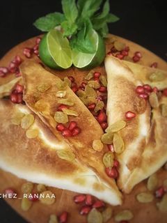 صورة لوصفة 🌺 فطاير سبانخ بالزبيب