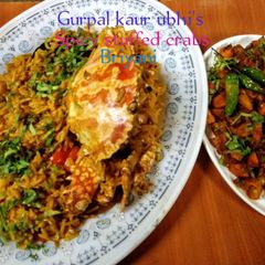 A picture of Spicy stuffed crab Biryani 🦀.