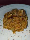 Arroz con costillas adobadas con chimichurri, habitas, papada y tocineta