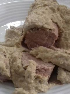 Una foto de Solomillo de cerdo con salsa de champiñones