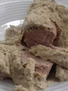 Una foto de Solomillo de cerdo con salsa de champiñones