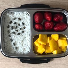 A picture of Rice Pudding with Fruits and Berries.