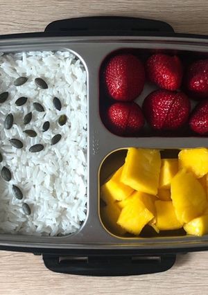 A picture of Rice Pudding with Fruits and Berries.