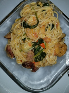 A picture of Shrimp and sausage w/Angel hair pasta in a Cajun cream sauce.