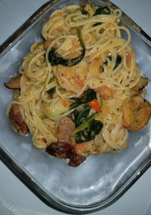 A picture of Shrimp and sausage w/Angel hair pasta in a Cajun cream sauce.