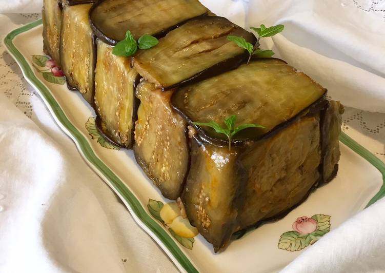 Timballo di riso con copertura di melanzane