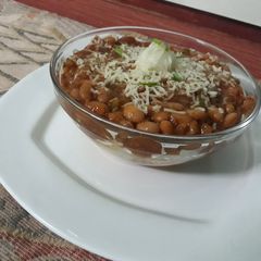 A picture of Garlic rice balls and baked beans.
