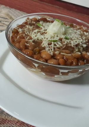 A picture of Garlic rice balls and baked beans.