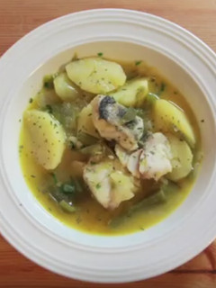Una foto de Patatas con bacalao
