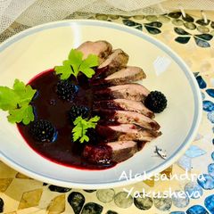 Duck with blackberry sauce A picture of Duck with blackberry sauce.
