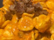 Una foto di orecchiette pomodoro